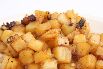 Fried potatoes with caramelized pork