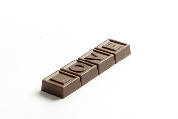 Love word made of little chocolates