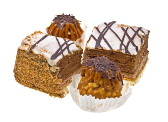 Cakes with chocolate isolated on white