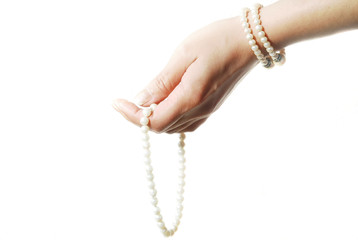 pearls in hand