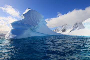 Luminescent iceberg and landscape in Antarctica - 20821006