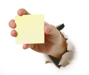 Hand mit Notizzettel