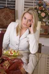 woman sad eating salad