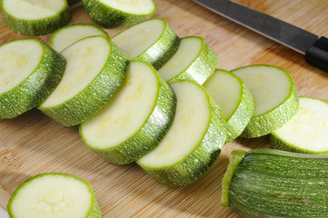 sliced zucchini on wood