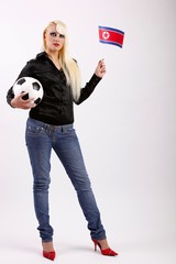 female football/soccer fan with football and flag (North Korea)