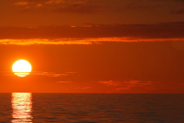Sunset over Costa Rica. Sun reaching ocean