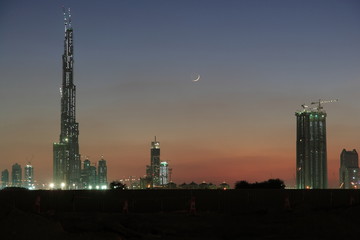 Fototapeta premium Construction site of worlds largest building at sunset.