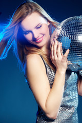 Naklejka premium Woman with disco ball