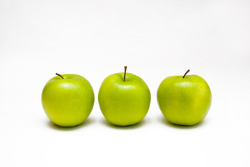 Three green apples