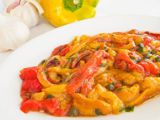 Roasted Bell Pepper Salad on white dish.