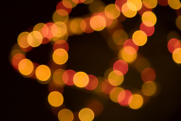 Multi color Christmas lights defocus background