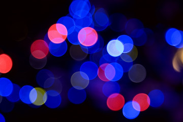 Multi color Christmas lights defocus background