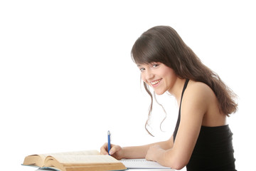 Teen girl learning at the desk