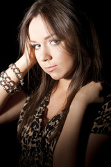 Obraz premium beautiful young girl in a leopard dress