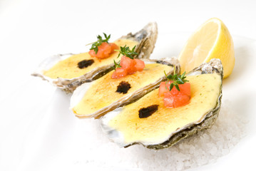 oysters with sauce and lemon