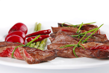 meat slices on white dish