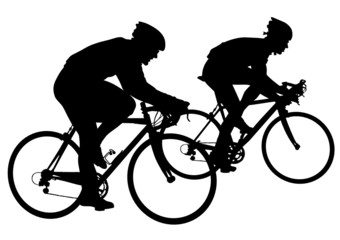 Two cyclists in motion