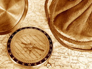 Fototapeta na wymiar compas lying on old map