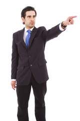 young business man in a suit pointing with his finger