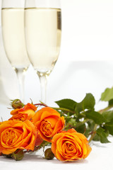 Roses and glasses of champagne