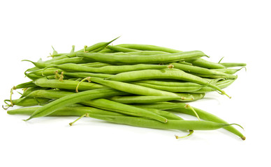 Pile of raw green beans over white background