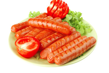 sausages served with tomato and salad