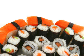 mixed sushi types on white