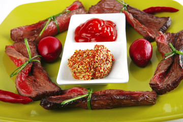 red meat on green plate