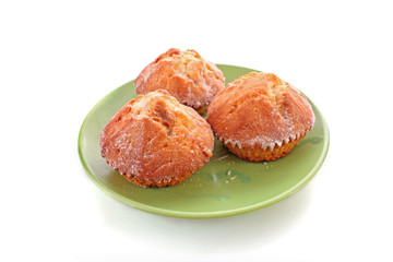 Three cupcakes on white background