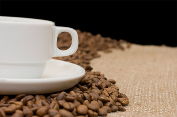 Cup from coffee on coffee grains