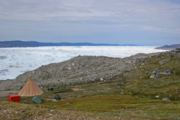 Camping at the Jakobshavn ice fjord, Greenland.