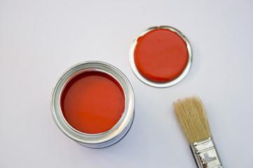 Red paint and brush