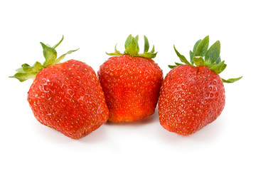 Ripe red strawberries on white background