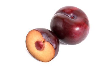 Fototapeta na wymiar plum with half