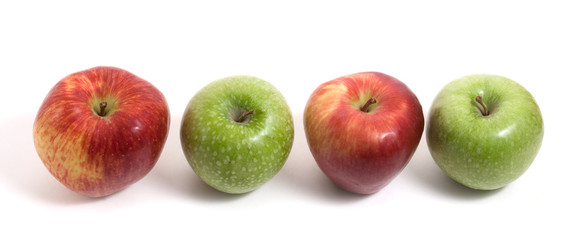 three fresh apples in a row