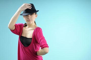 young dancer saluting with black hat