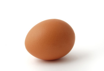Brown egg isolated on white