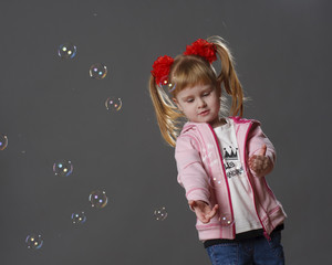 Girl and soap bubbles