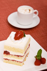 Strawberry cake with cappuccino