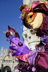 Obraz premium impressive purple beautiful gold mask at the carnival in Venice