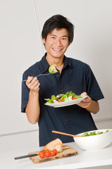 Man Eating Salad