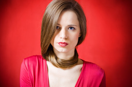 Beautiful girl on red