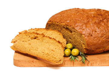 cut bread, rosemary, olives and wooden board isolated on a white