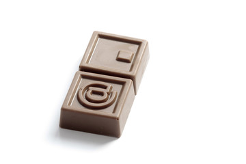 At and dot sign in chocolate