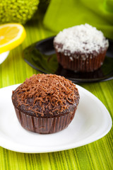 Muffins with chocolate and coconut decoration