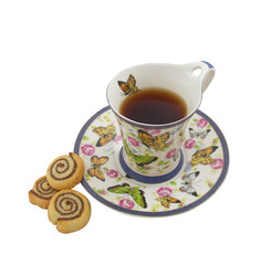 Cup of tea with cookies in the form of a snail