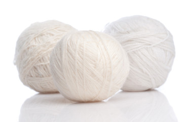 Fototapeta na wymiar White wool threads