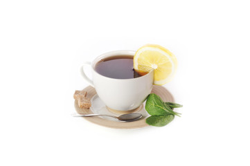 full cup of tea with lemon
