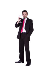 Obraz premium Businessman celebrating with a glass of drink