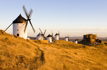 windmills with castle, Consuegra, Castile-La Mancha, Spain - obrazy, fototapety, plakaty